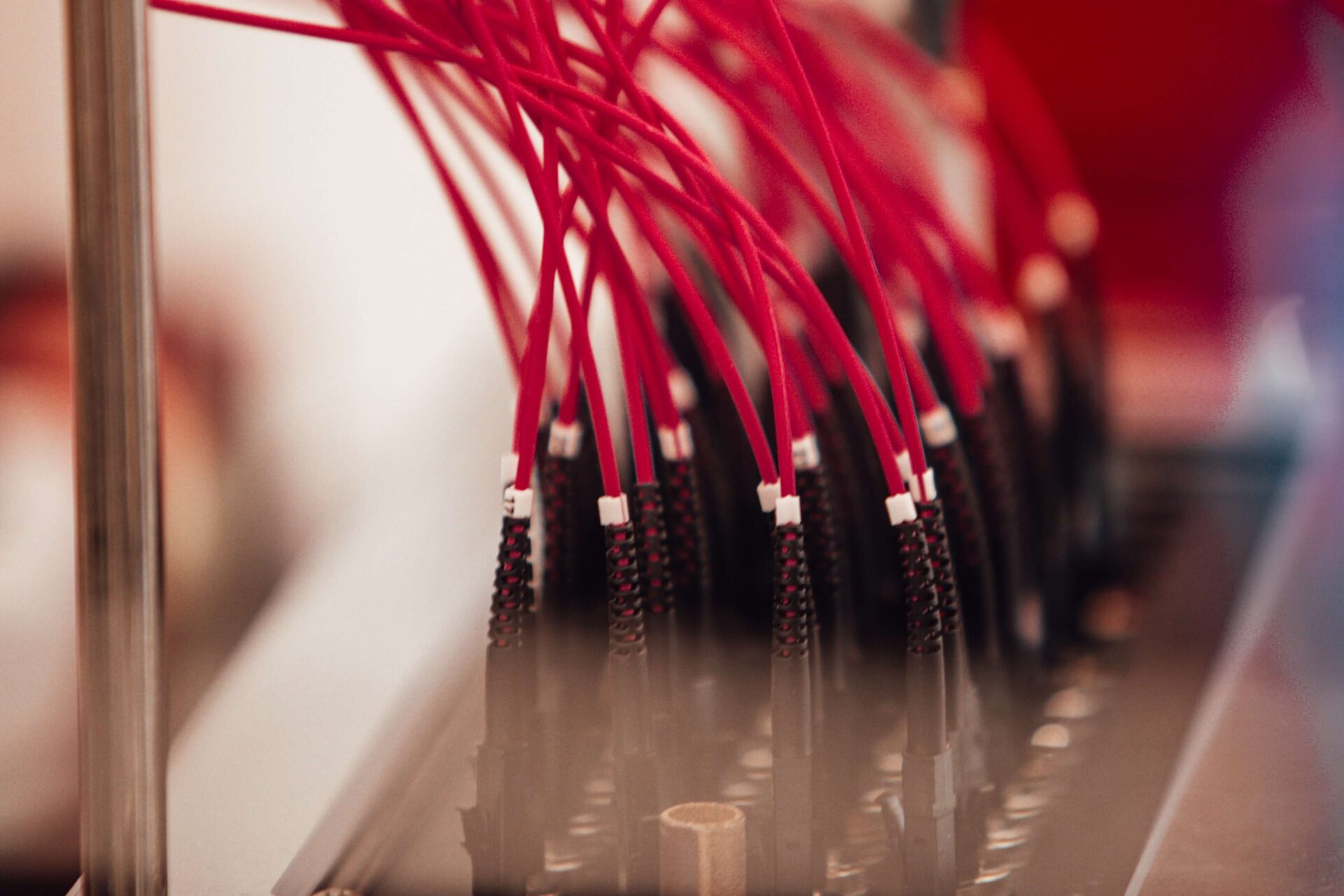 Red colored data wires attached to a port.